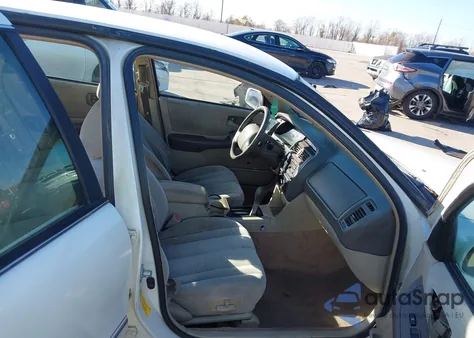 1999 Toyota Avalon Xl from USA, damaged, VIN 4T1BF18B0XU317004